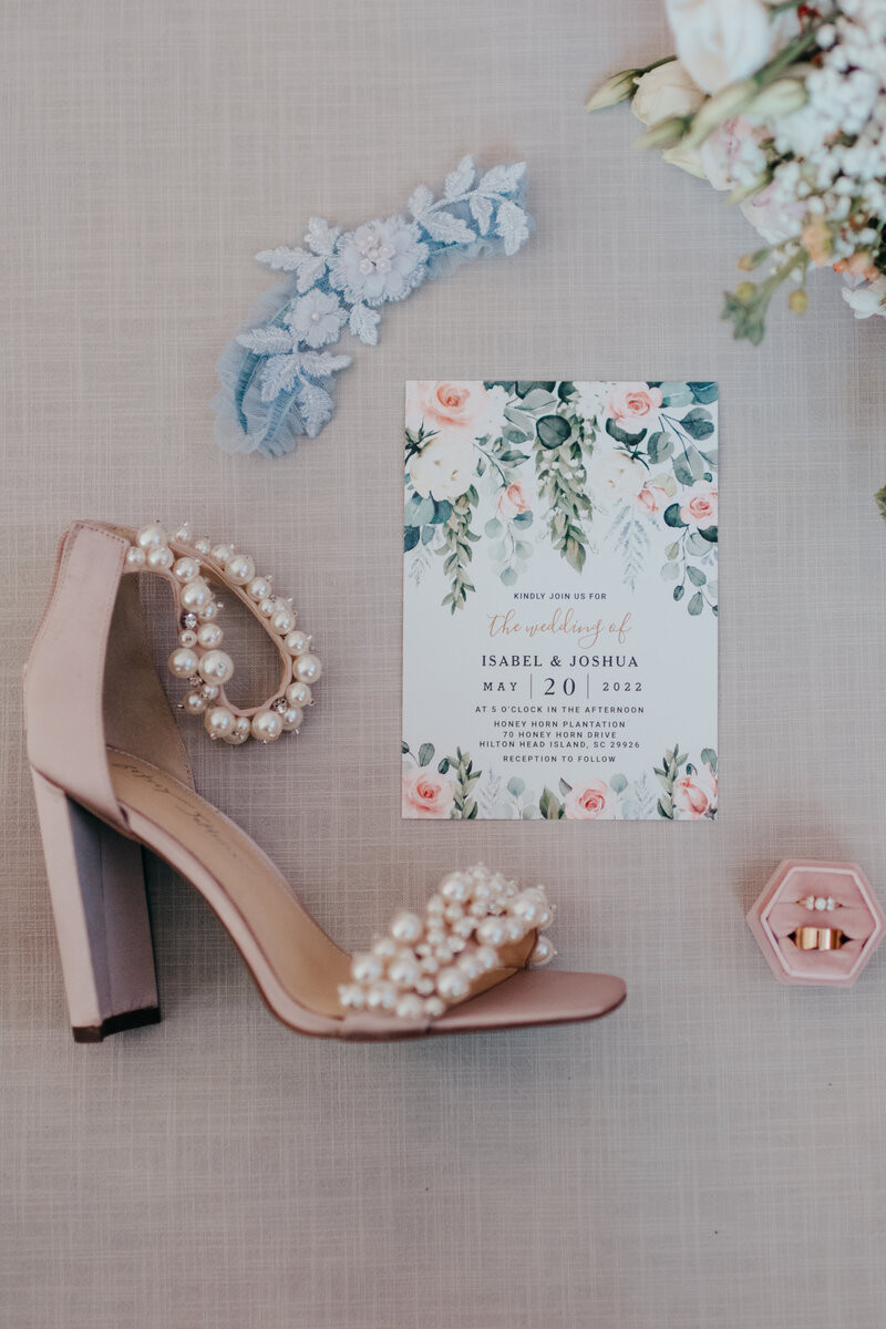 Bridal shoe, wedding rings, florals and invitation  for hilton head wedding