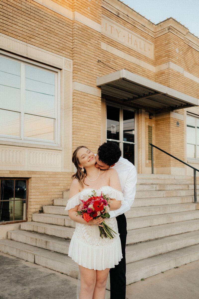 Newly married couple that eloped in the Downtown Austin courthouse. Elopement Photographer in Austin  | Photos by Meggie