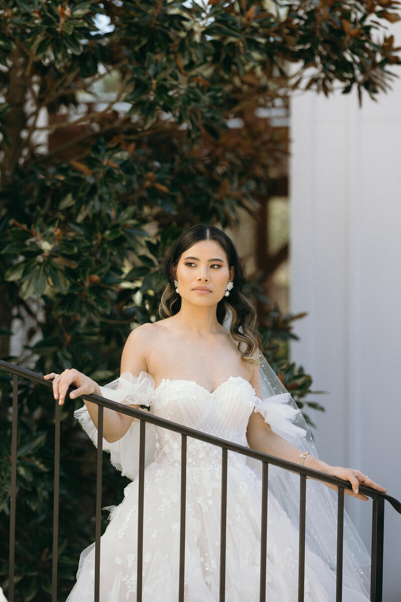 Bride holding her bouquet and getting ready for her wedding day before she gets married.