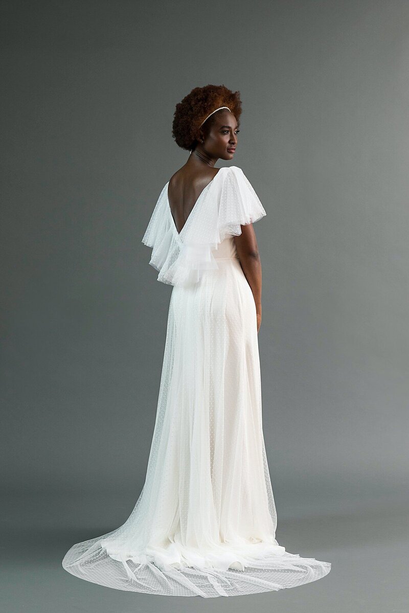 flowy a-line wedding dress with pearl details, sheer sleeves