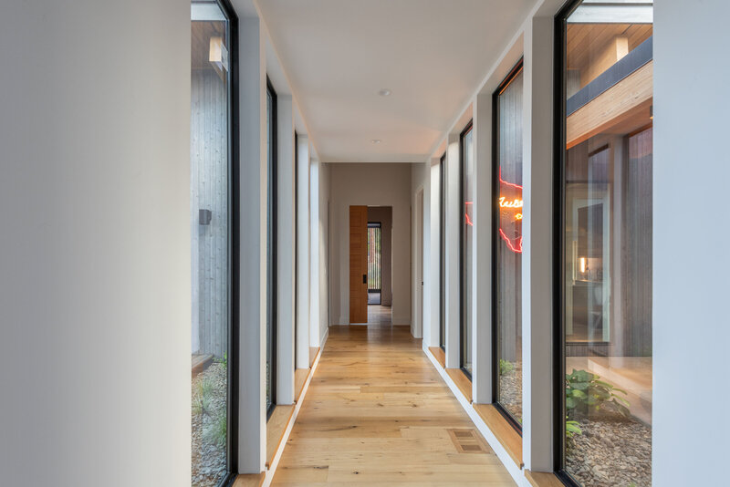 modern-hallway-windows-wood-floor