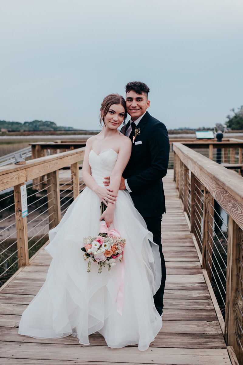 couple portraits at coastal discovery museum wedding