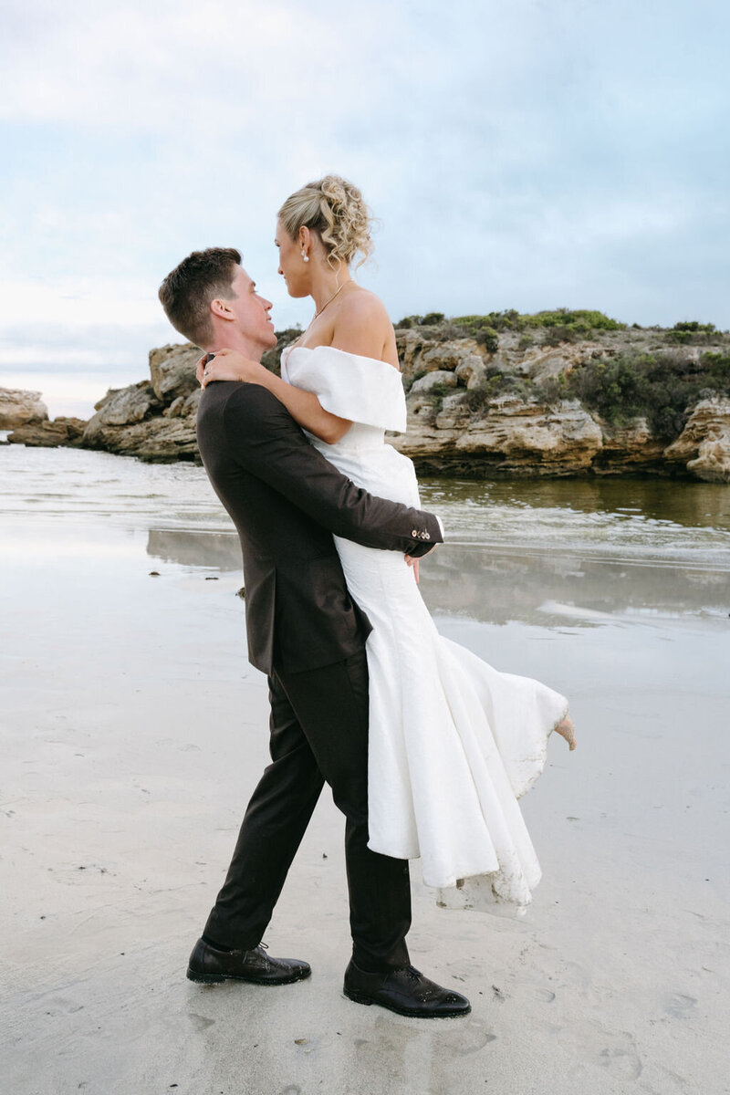 care free couple on their wedding day at middle island warrnambool