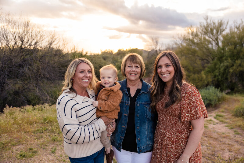 generational image of grandma with daughters and grand baby