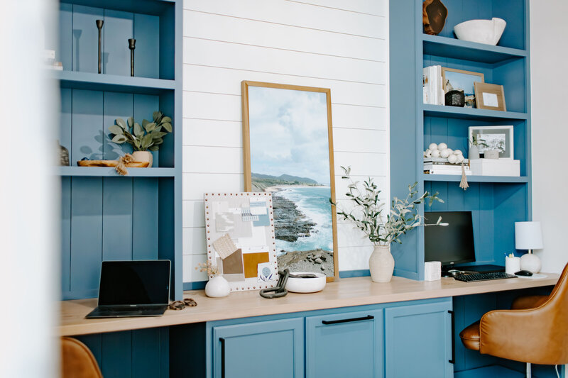Functional and beautiful home office with built-ins, organized layout, and stylish decor by Holling Home Interiors.
