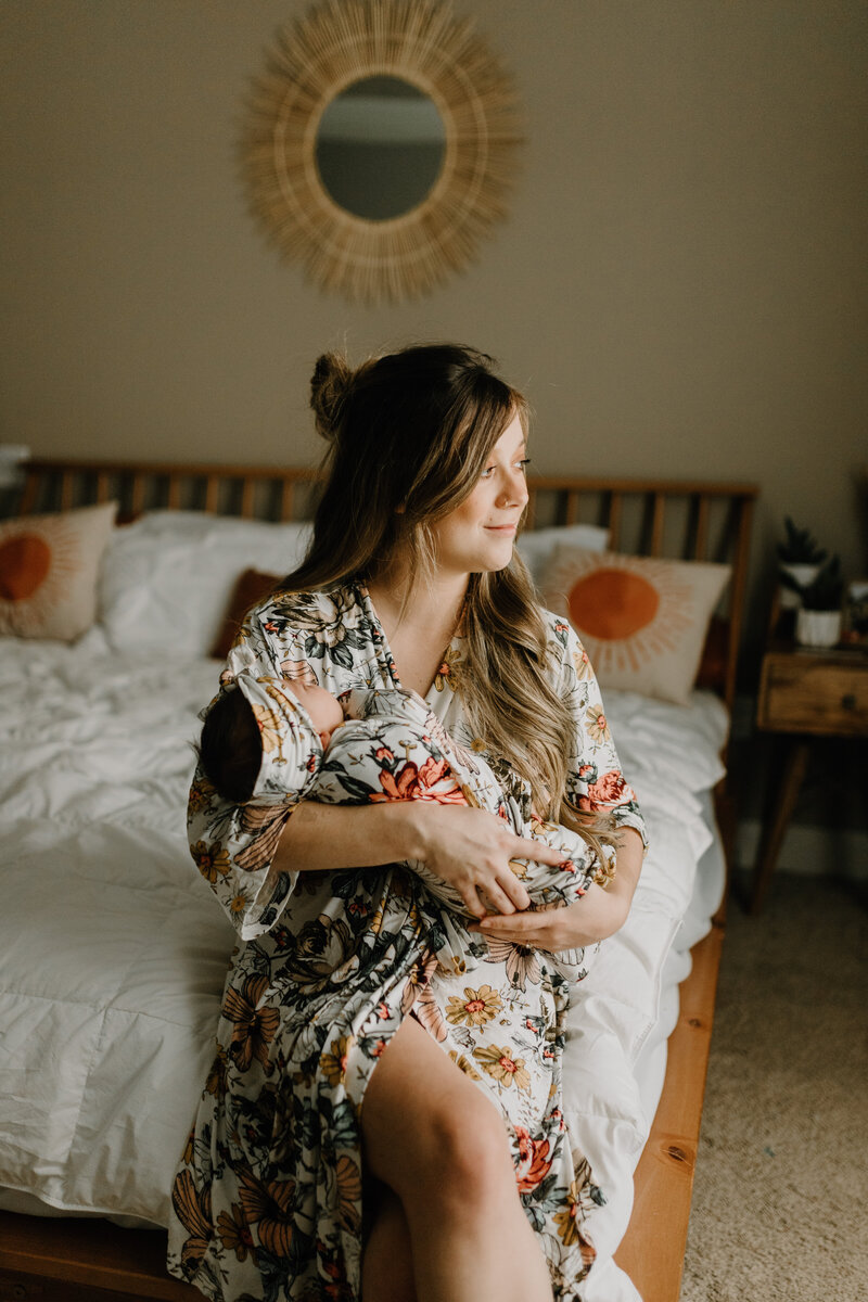 Mom holding her newborn baby