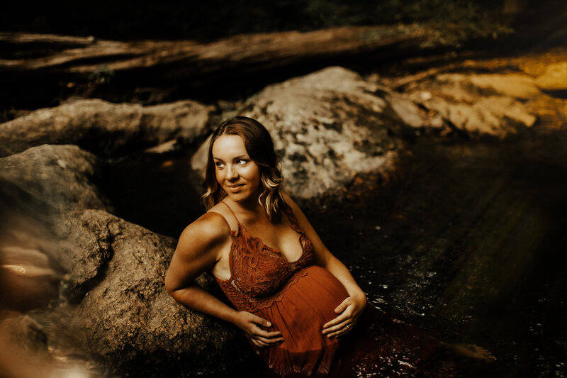 Pregnant mom in water for creek maternity session by Brey Photo in Media Pennsylvania