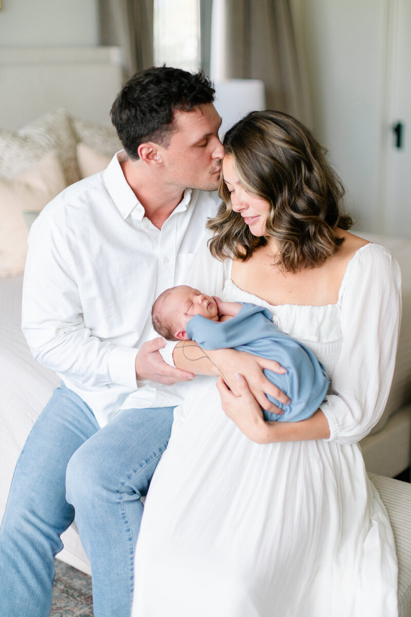 In-studio Maternity Session with floor floral arrangments for mother's day minis photoshoot