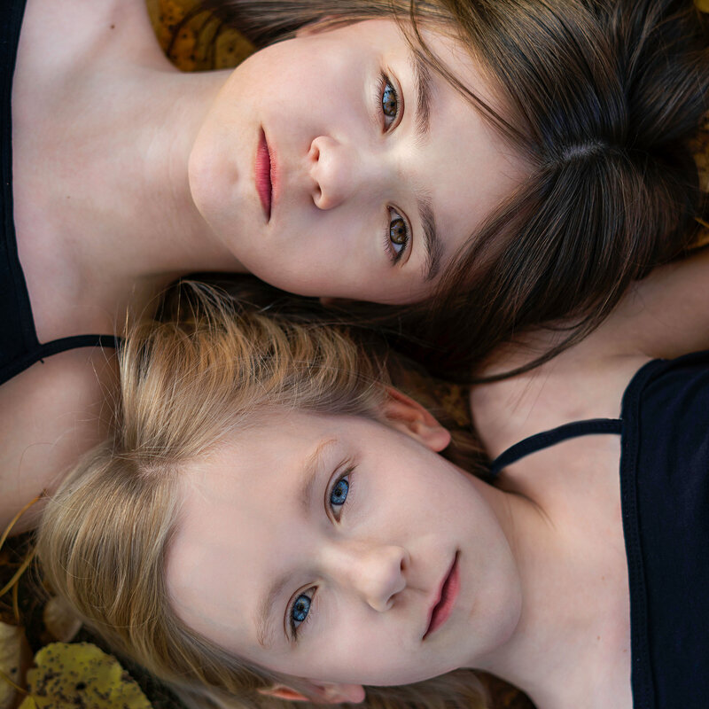 Fall portrait of two sisters