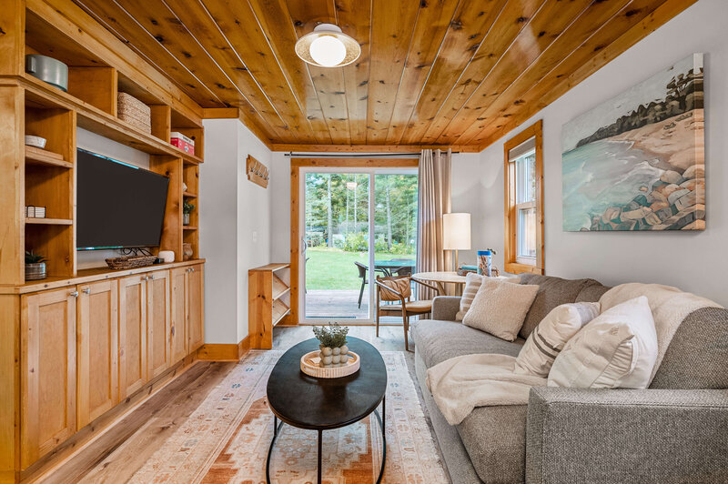 Living room in lake house with cedar ceiling