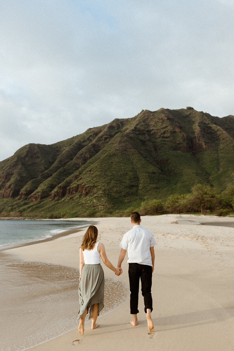 Couple on the beach in Maui at sunset