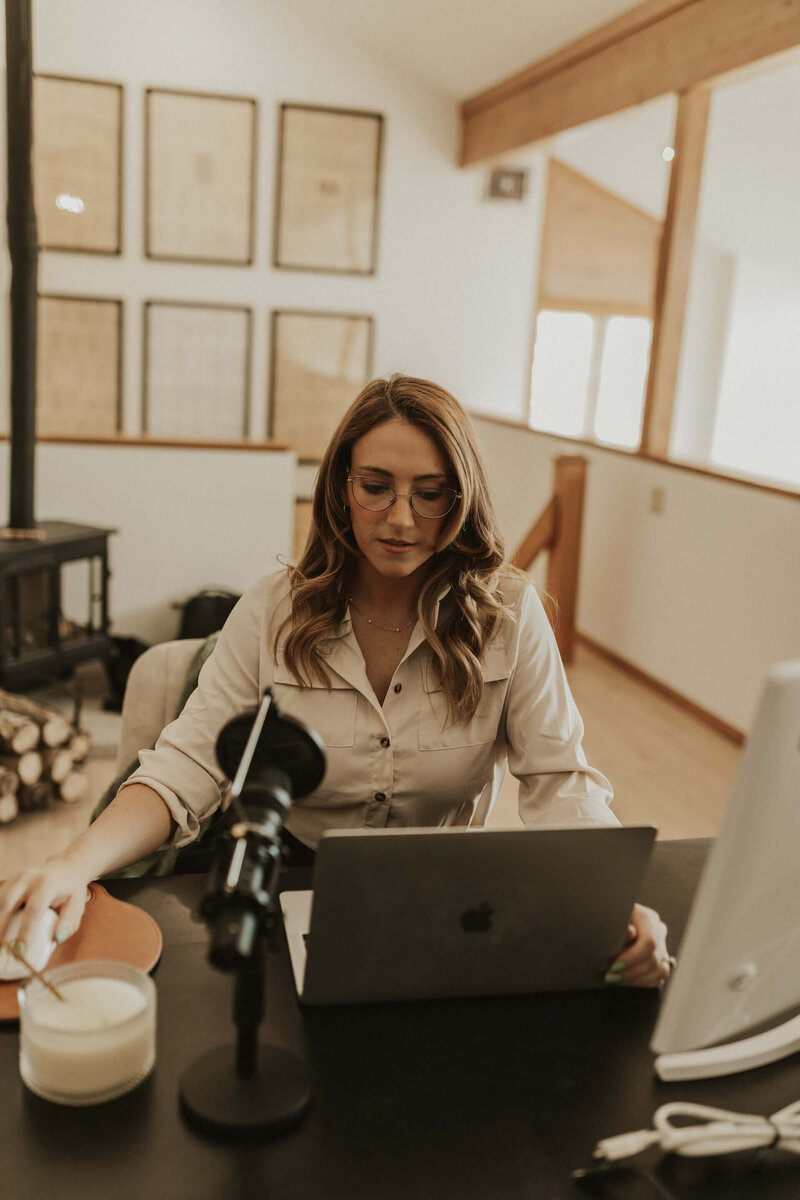 Career coach recording podcast at desk