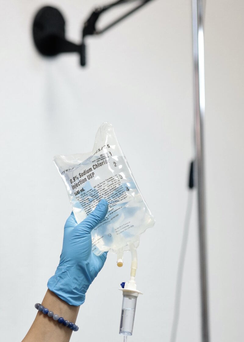 IV bag hanging from pole