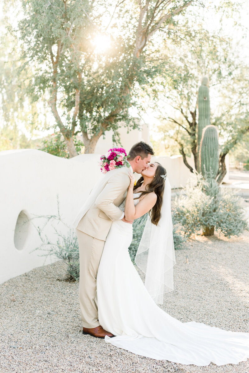 Bride and groom kissing in Arizona