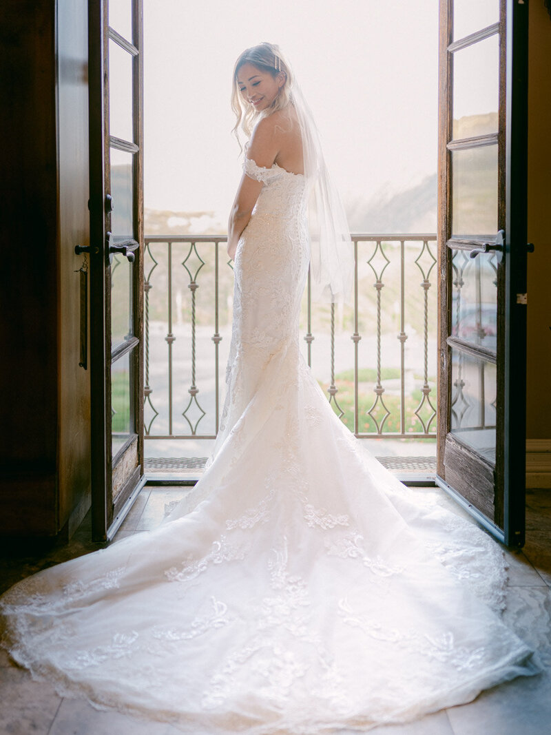 An intimate, vineyard-set wedding at Gershon Bachus Vintners, where Tak + Tammy exchanged vows framed by sweeping views, floral-laced pergolas, and a champagne tower at sunset. From custom stationery suites pressed with hand-drawn vineyard sketches to candlelit dinner tables lined with silk runners and local farm-to-table menus, every moment was curated for sensory elegance. Captured with an editorial eye by Michael Asmussen, a world-traveled destination wedding photographer known for timeless imagery rooted in emotion and refined aesthetics. Explore more of Michael’s work across Southern California, Napa, Tokyo, Seoul, and the Amalfi Coast—designed for couples who value heritage, intimacy, and heirloom storytelling.