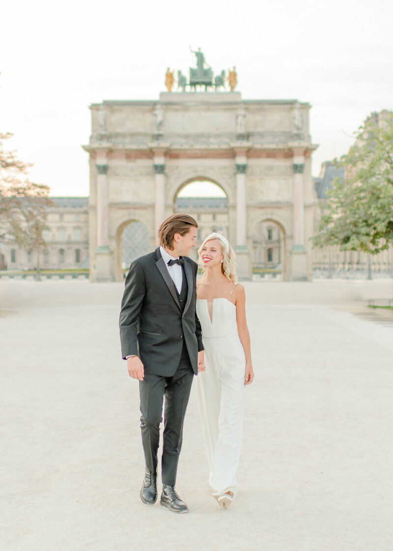 couple walking at park in paris, france. 