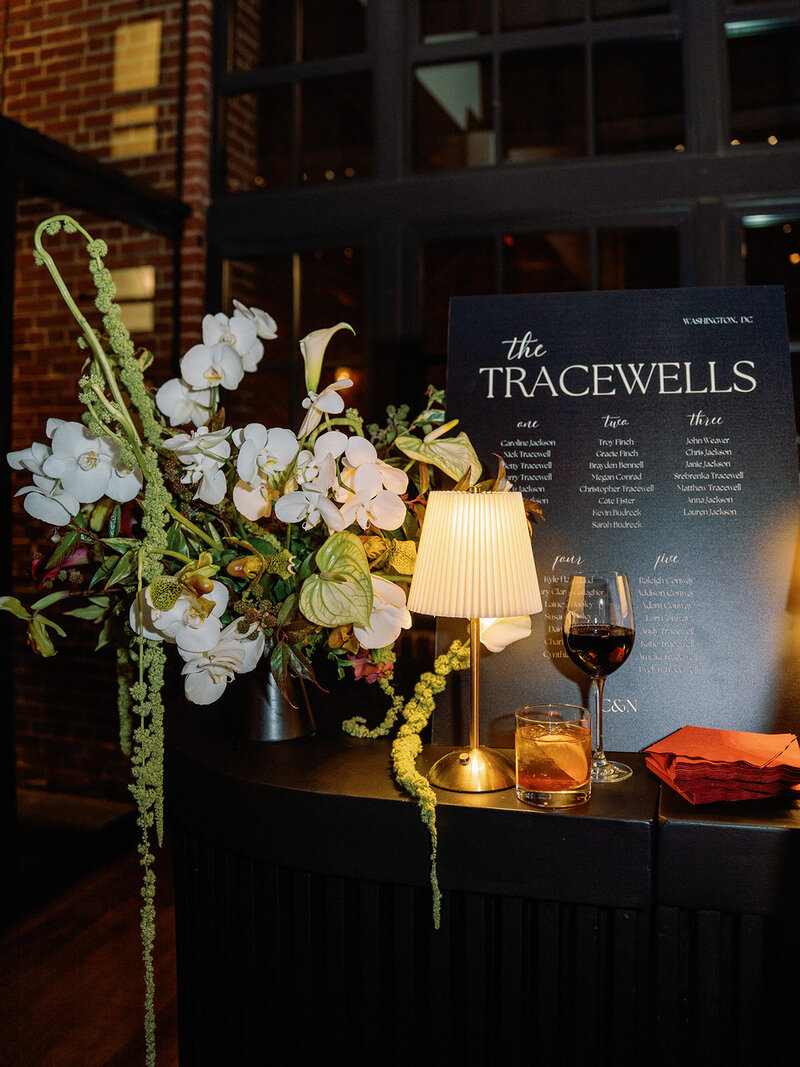 Burgundy and green modern welcome party and rehearsal dinner at Ritz-Carlton Georgetown DC