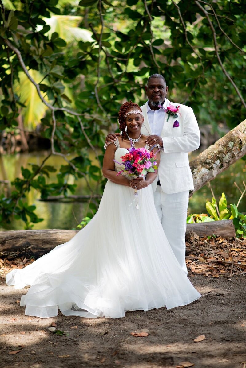 Bride and groom smile in St. Lucia wedding