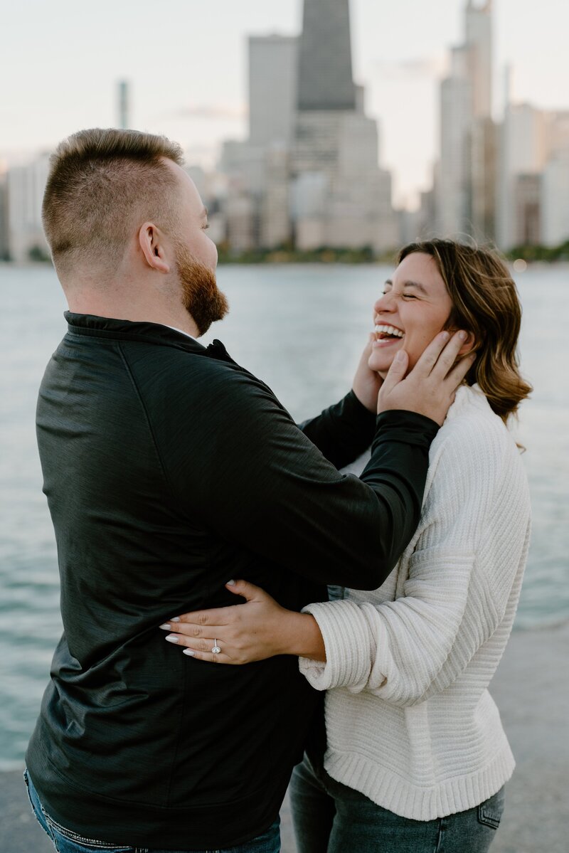 Michigan couples photos with downtown skyline in background