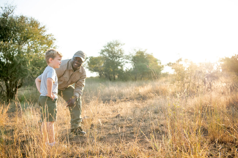 Boy with a safari guide