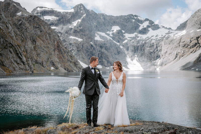 bride and groom vow renewal by lake erskine
