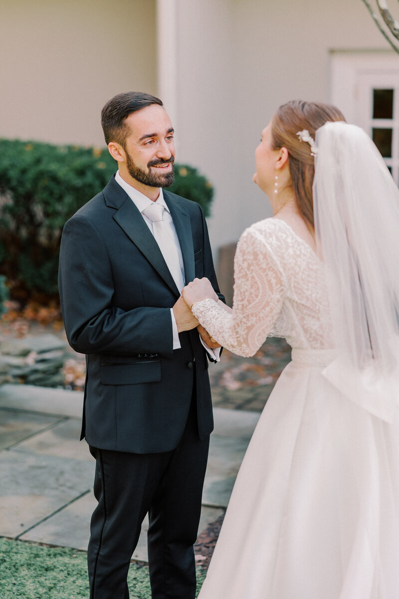 Bride and groom walk up memorial steps at their DC wedding