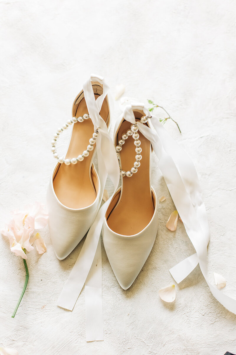 Wedding shoes with pearl ankle represent the elegant and thoughtful details of Perfect Thirds and Co as a wedding planner. 