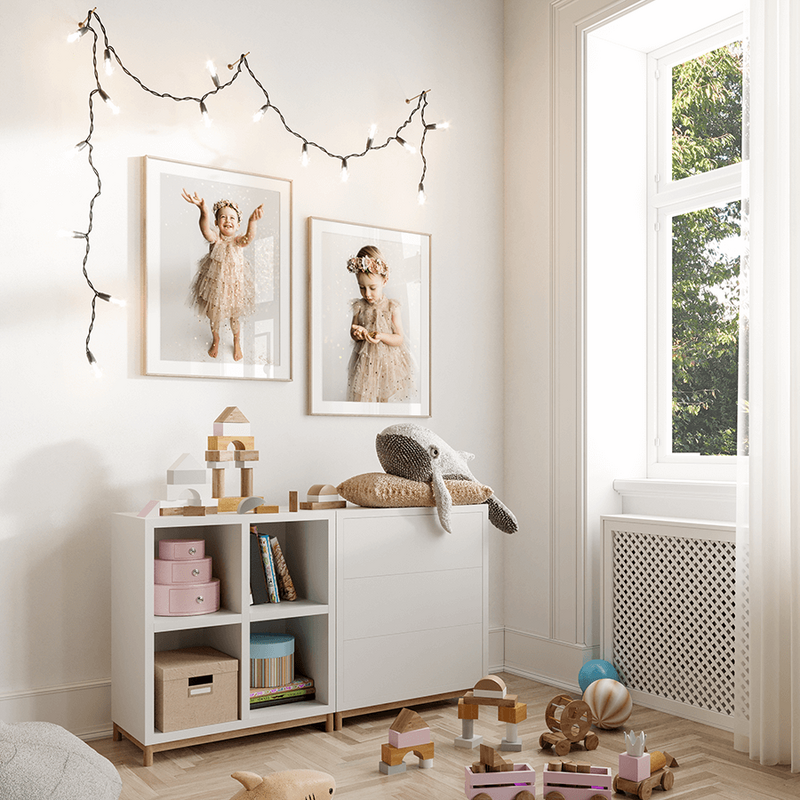 Glitter session pictures on the wall of a modern playroom