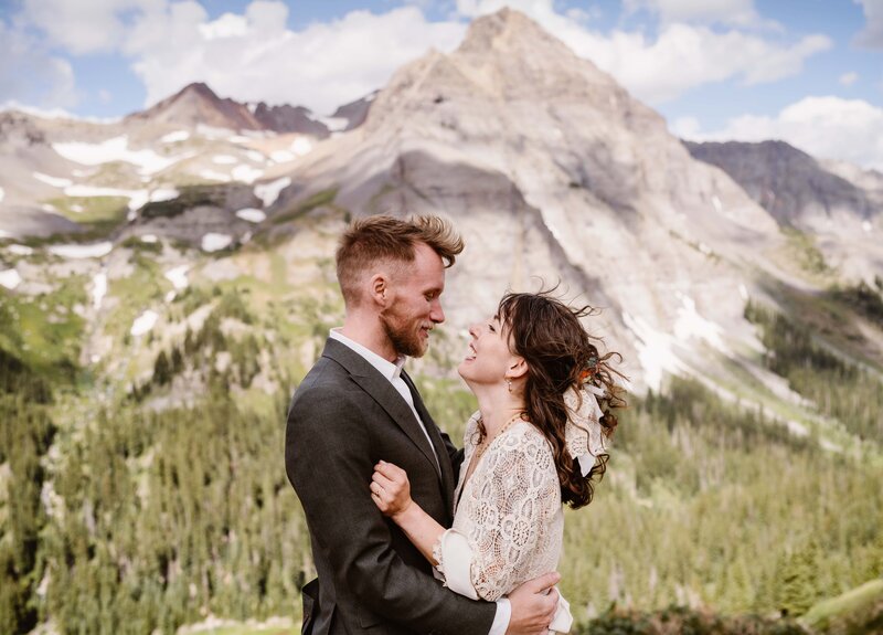 Couples hikes to Blue Lakes in Telluride, Colorado for their sunrise elopement