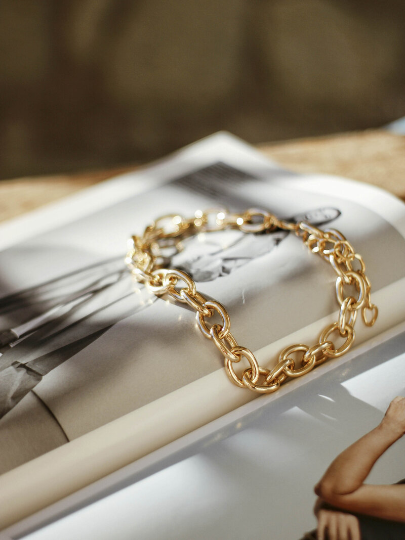 Open magazine with jewelry on it