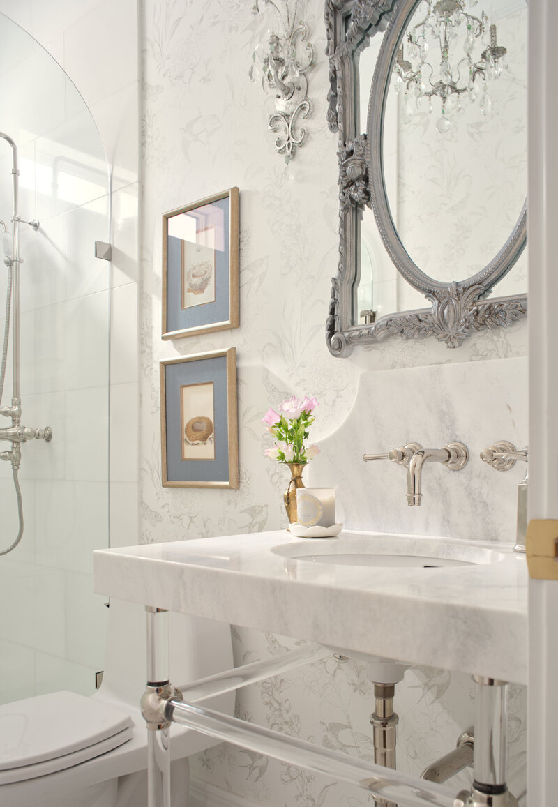 bathroom sink with silver mirror and shower