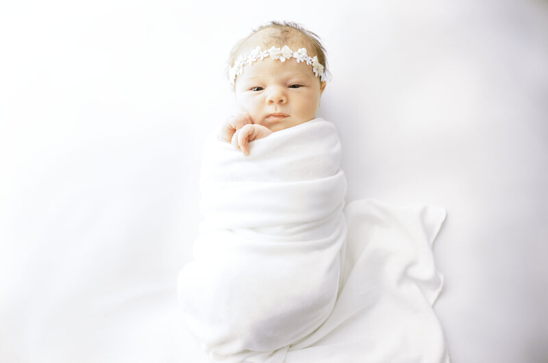 Newborn baby girl, alert in-studio session