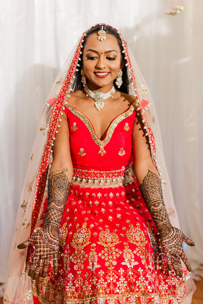 a bride posing in her wedding dress