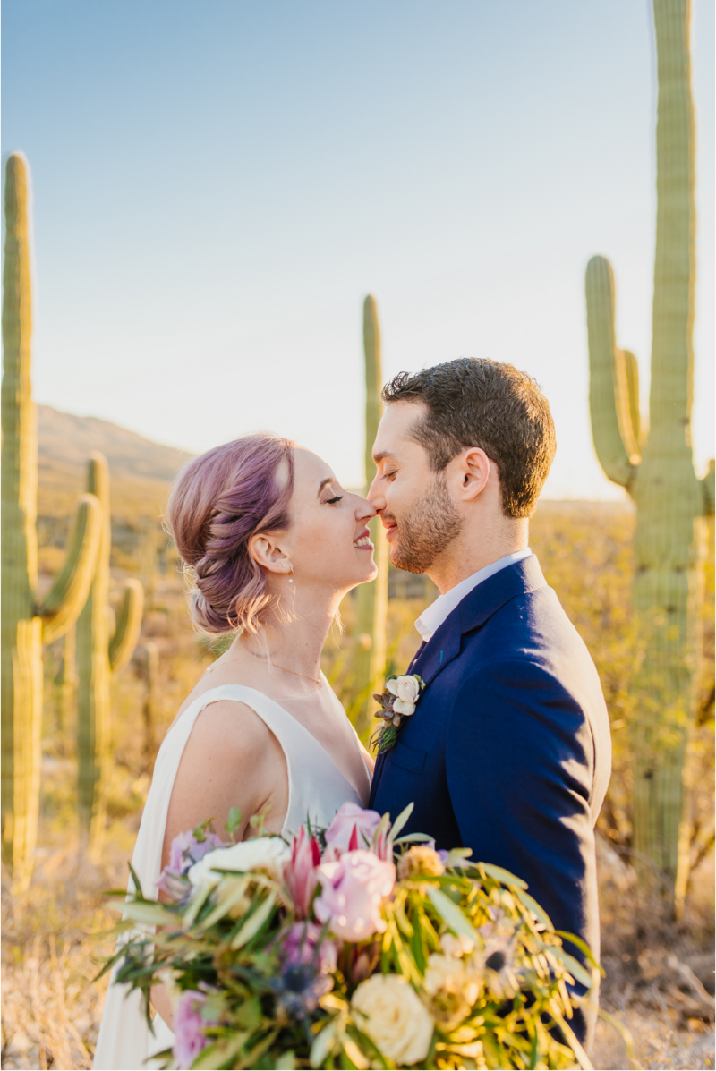 couple-kissing-by-cacti@2x
