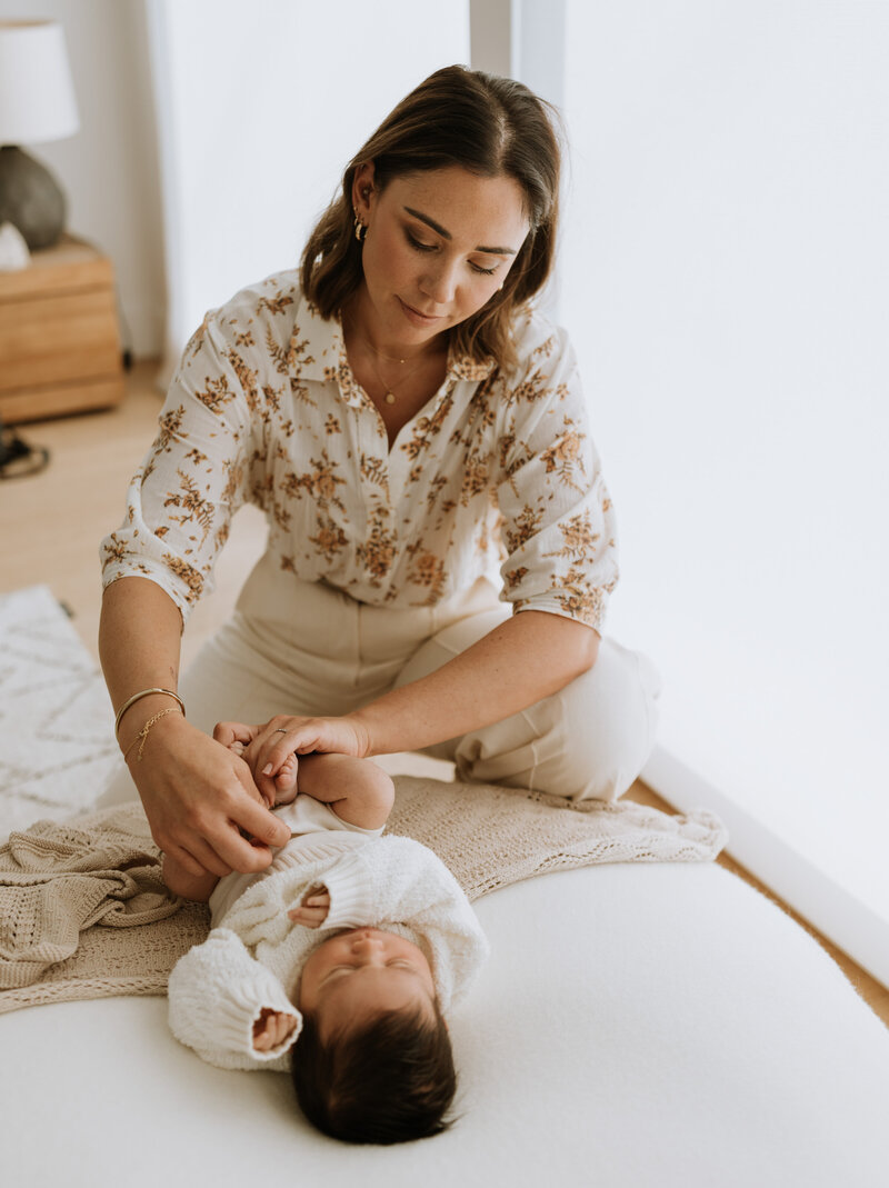 Sophie Lea with newborn baby in natural light, photographed by Sydney newborn photographer 