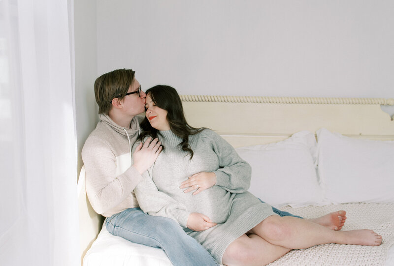 couple in studio pregnancy photos