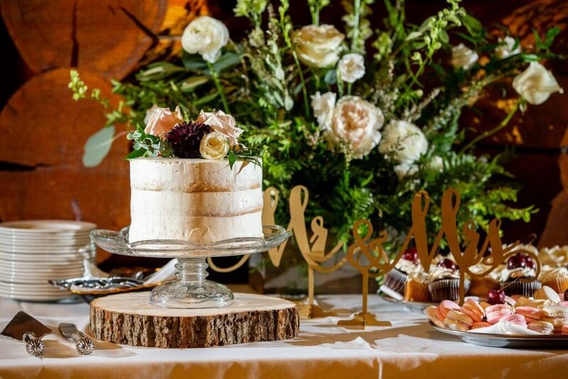 This beautiful photograph showcases a wedding cake at the Lougheed House reception, highlighting the elegance and charm of this historic Calgary venue.