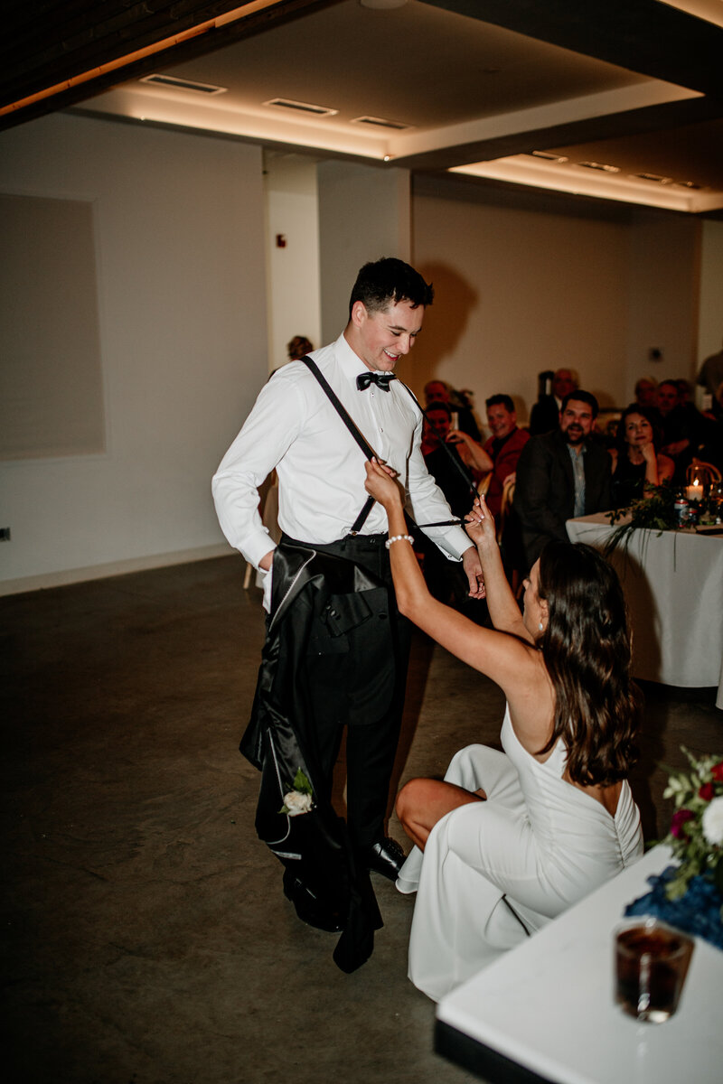 Fun wedding reception photos of the bride and groom on the dance floor