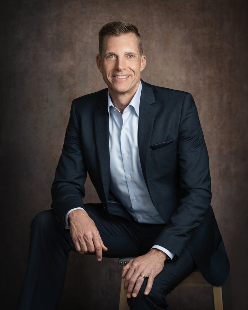 Business headshot of businessman in a suit