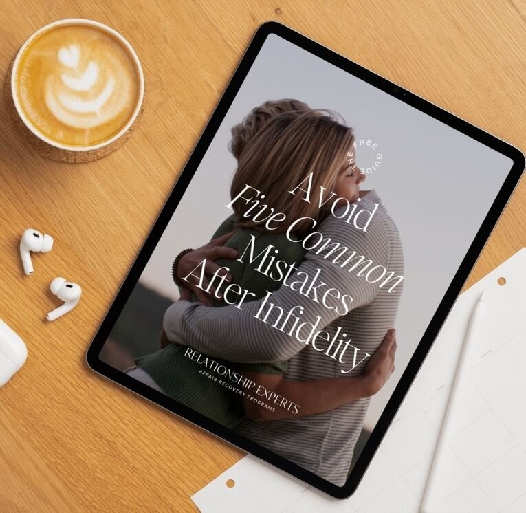 Tablet on a desk displaying the free guide “5 Mistakes to Avoid After Infidelity” by Relationship Experts, showing a couple embracing and symbolizing hope and healing after betrayal.