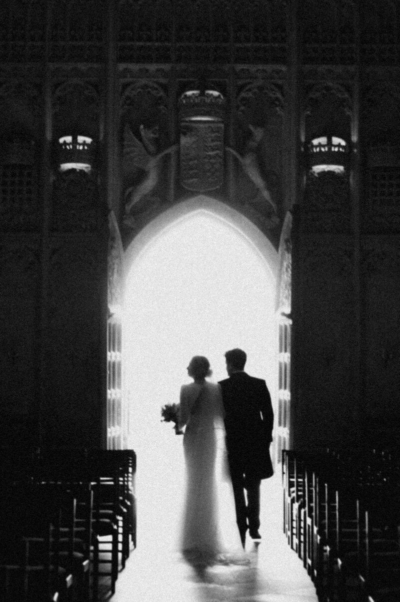 Tender moment between bride and husband during intimate wedding in Cambridge