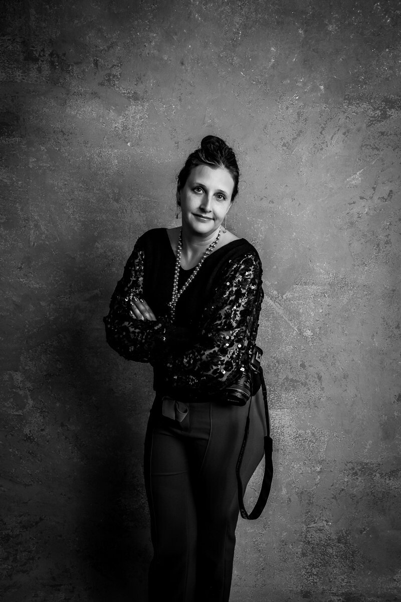Black-and-white photo of photographer Heidi Iliff