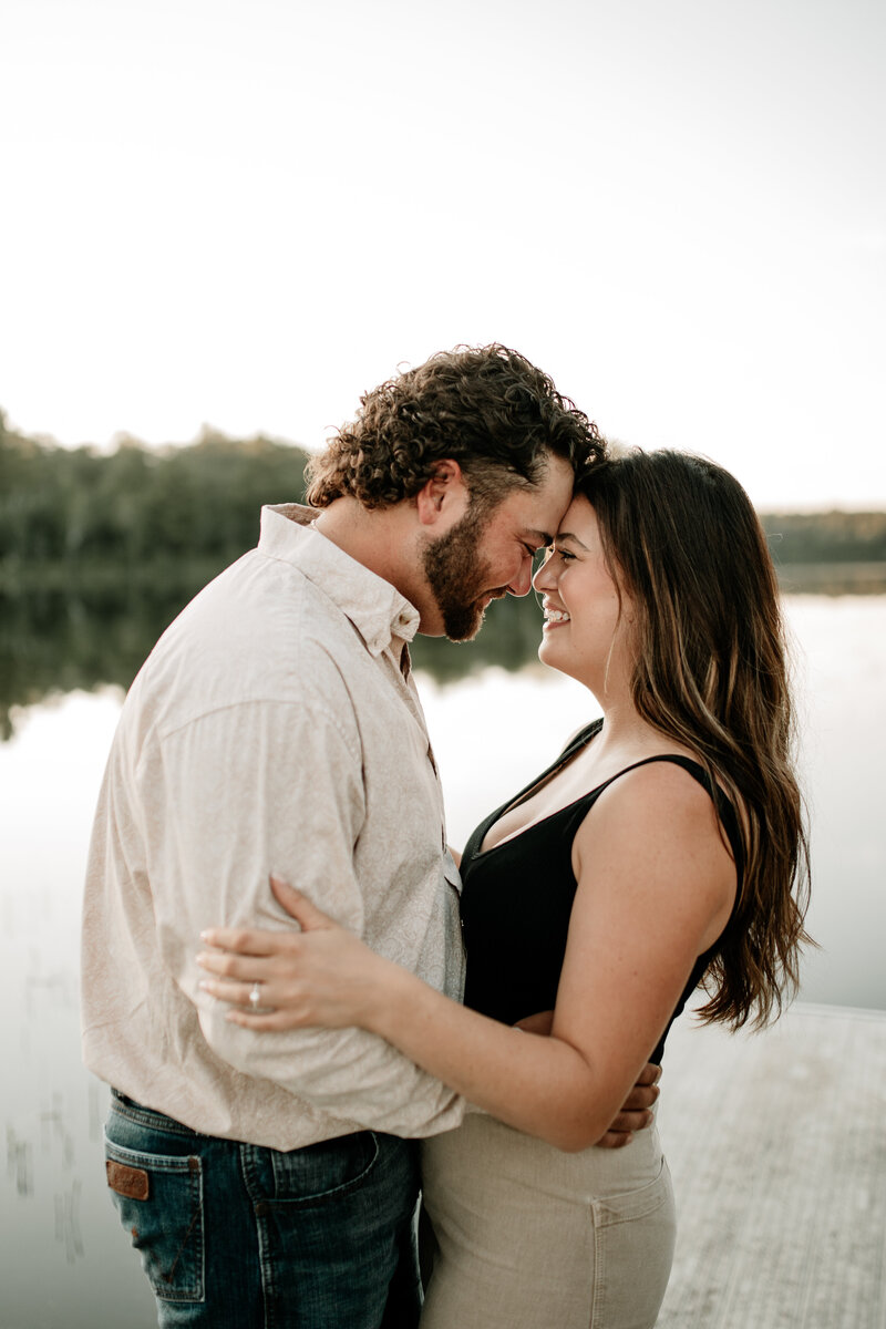 Minnesota golden hour summer engagement session on the lake