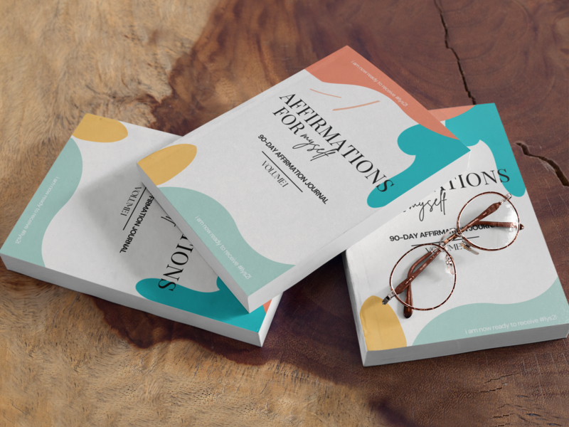 mockup-of-three-books-and-reading-glasses-on-a-wooden-table-a17420 (1)