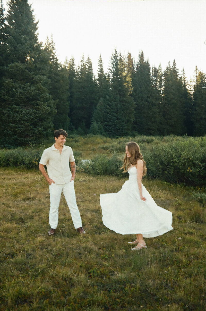 Cinematic couples photos in a meadow