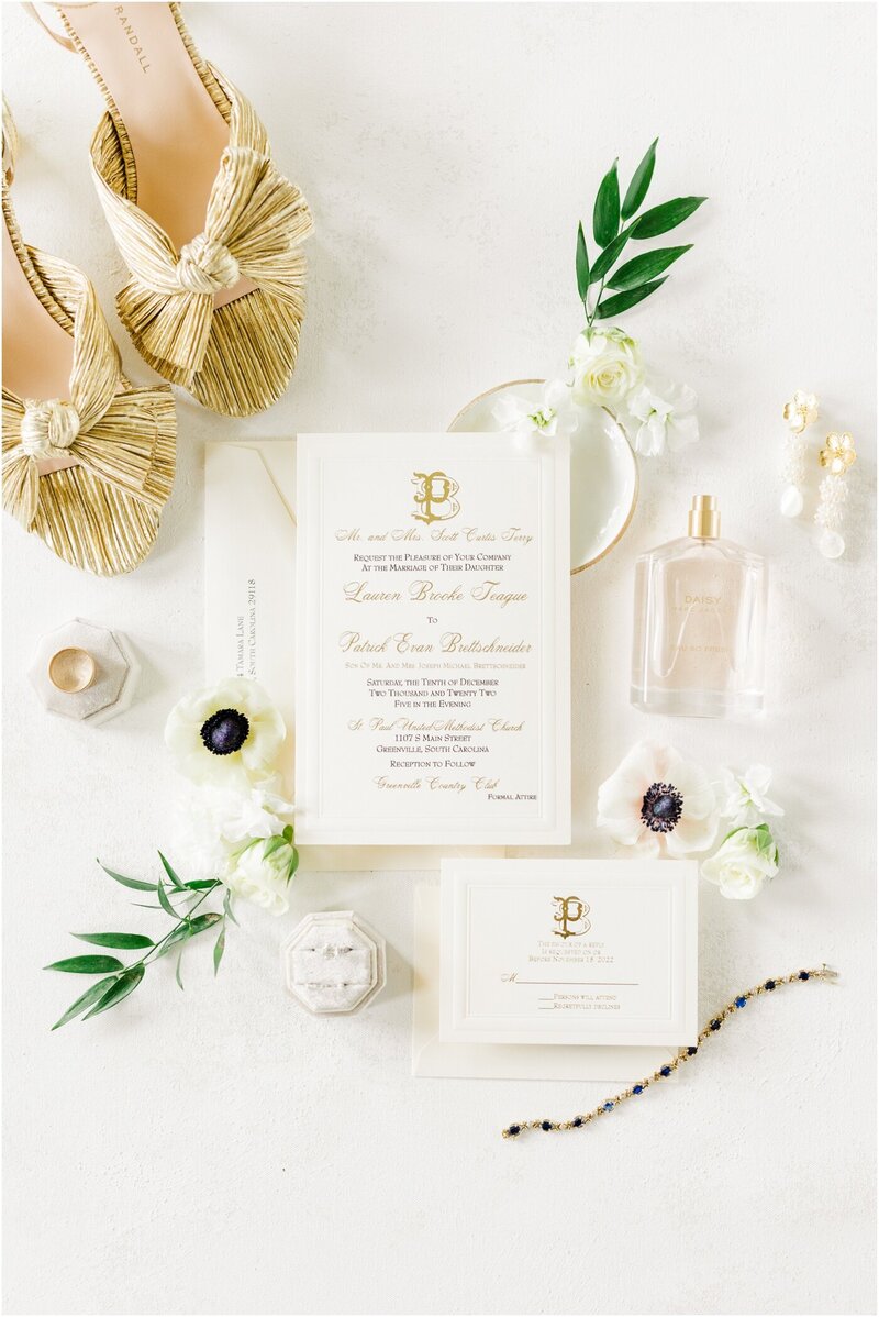 invitation, bridal shoes, and other wedding details