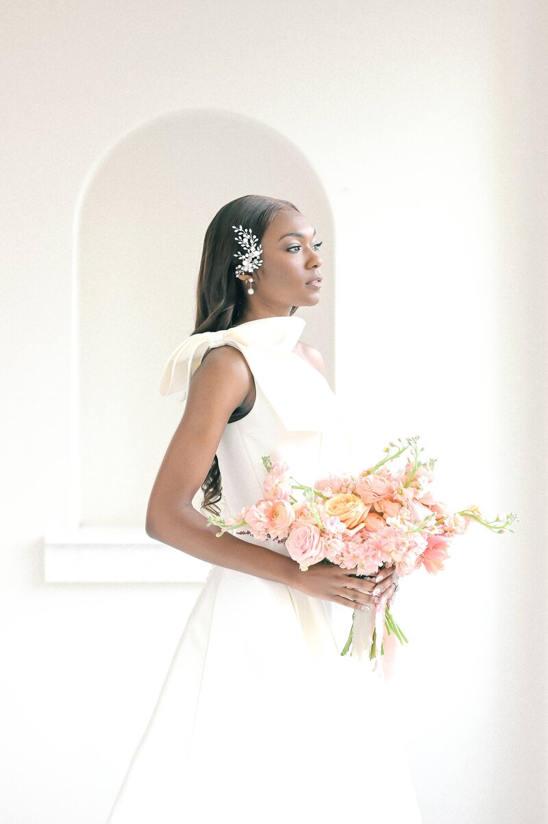 Fort Worth Wedding Photographer | DFW Photographer Rae De Lain Weddings Light and Airy | Bride and groom embracing