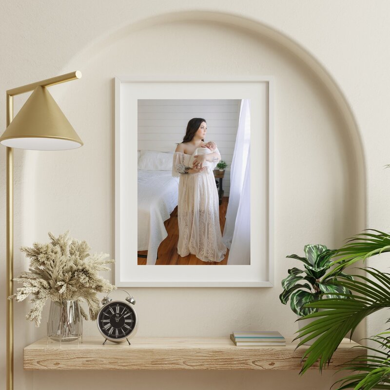 Mother and newborn baby in a framed print