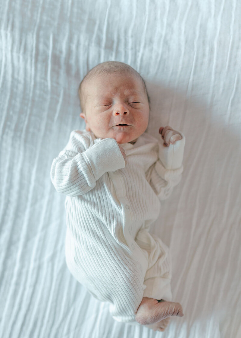 Newborn baby boy laying