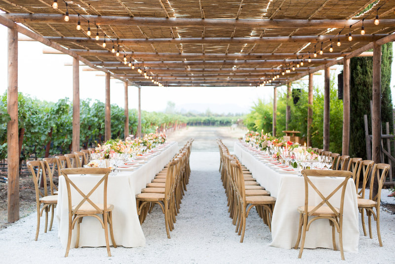 Wedding welcome dinner by Jenny Schneider Events at Round Pond Estate in Napa Valley, California. Photo by Eric Kelley Photography.